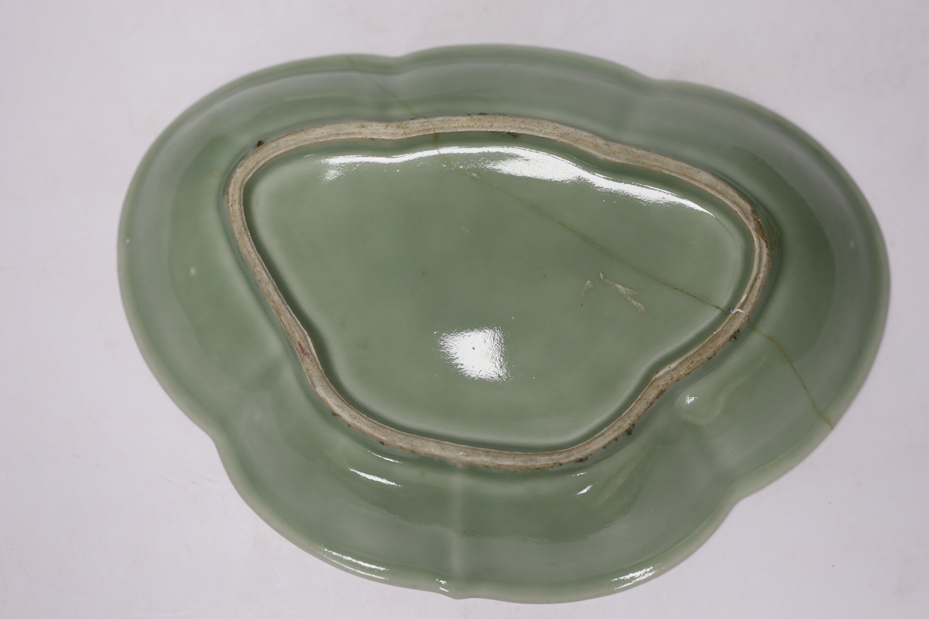Eight 19th century Chinese celadon glazed famille rose dishes, largest 26cm